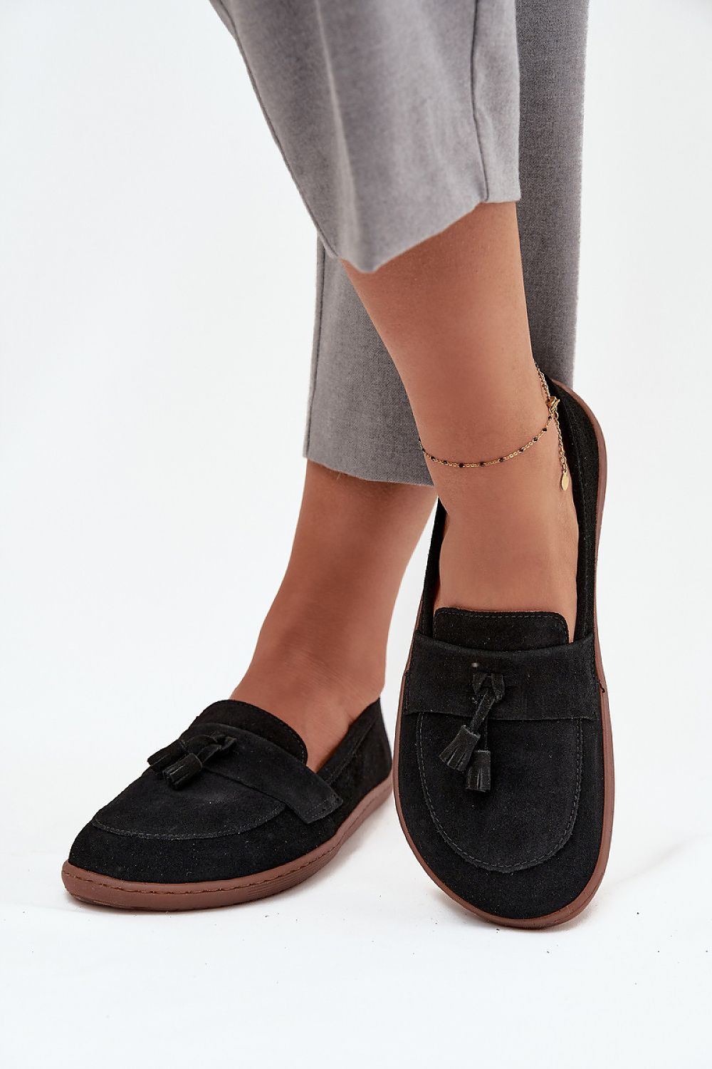 Step in Style luxury moccasins for women, crafted from soft suede leather, showcasing stylish tassels and designed for ultimate comfort.