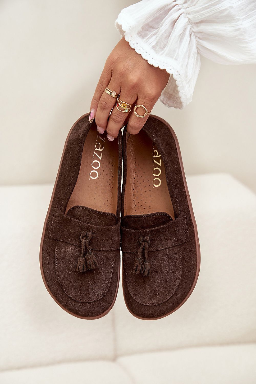 Chic women's suede moccasins with tassels from Step in Style, showcasing a combination of comfort and luxury in footwear.