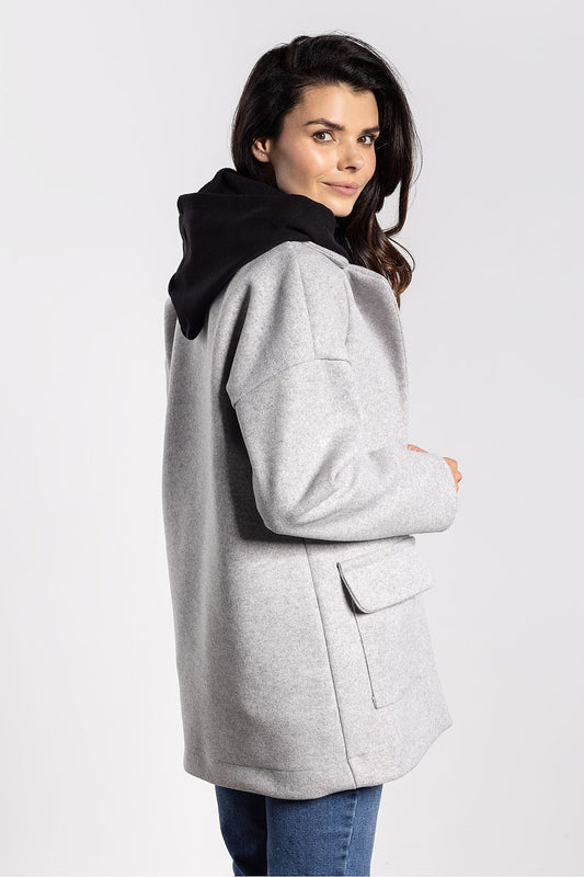 High-quality women's oversized jacket by Awama, designed with a modern silhouette and sophisticated button fastening.