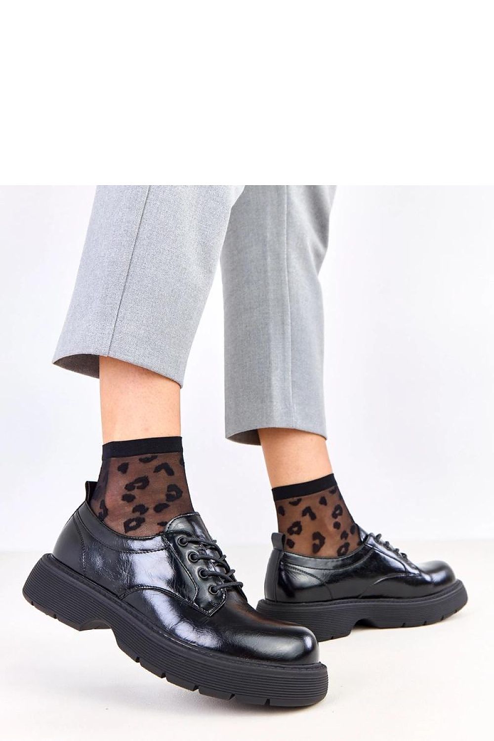 Solea elegant platform half shoes displayed on a stylish background, emphasizing versatility and comfort for modern women, available in EU sizes 36 to 41.