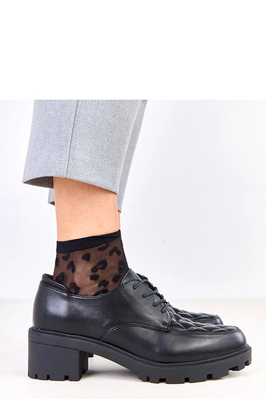 Close-up of Solea Quilted Lace-Up Heeled Shoes, highlighting the unique quilted front insert and genuine leather insole, offering a blend of comfort and luxury.