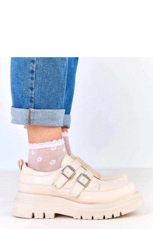 Solea slip-on platform shoes showcasing eco-leather exterior with decorative buckles, ideal for luxurious casual styling.