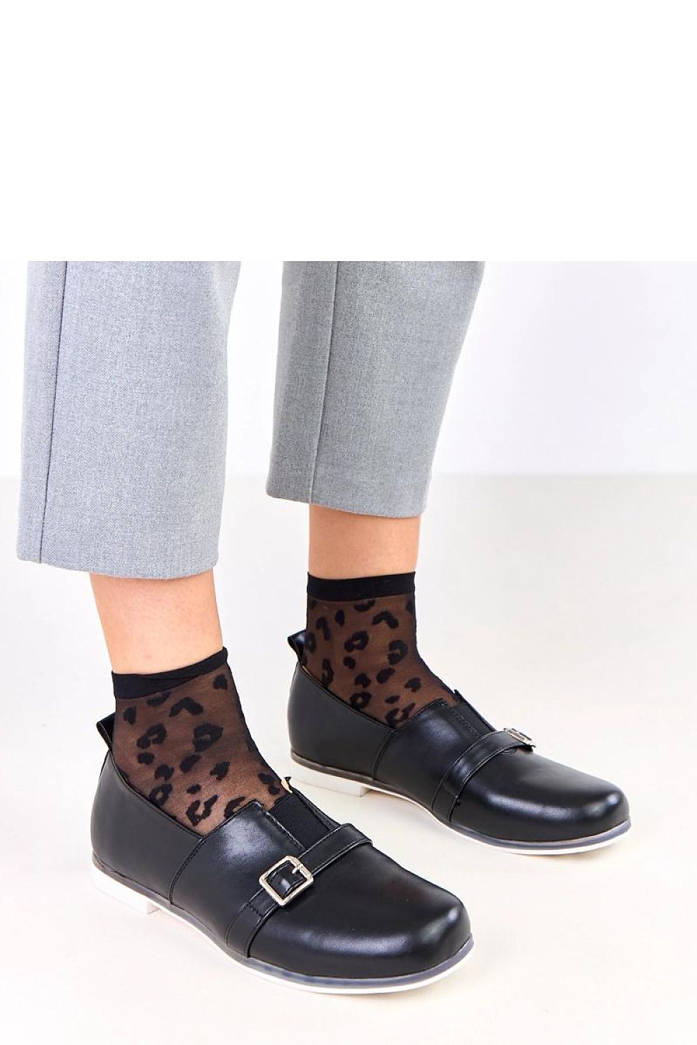 Solea elegant slip-on shoes in eco-leather with distinctive buckle, perfect for menswear that combines classic style with modern flair.