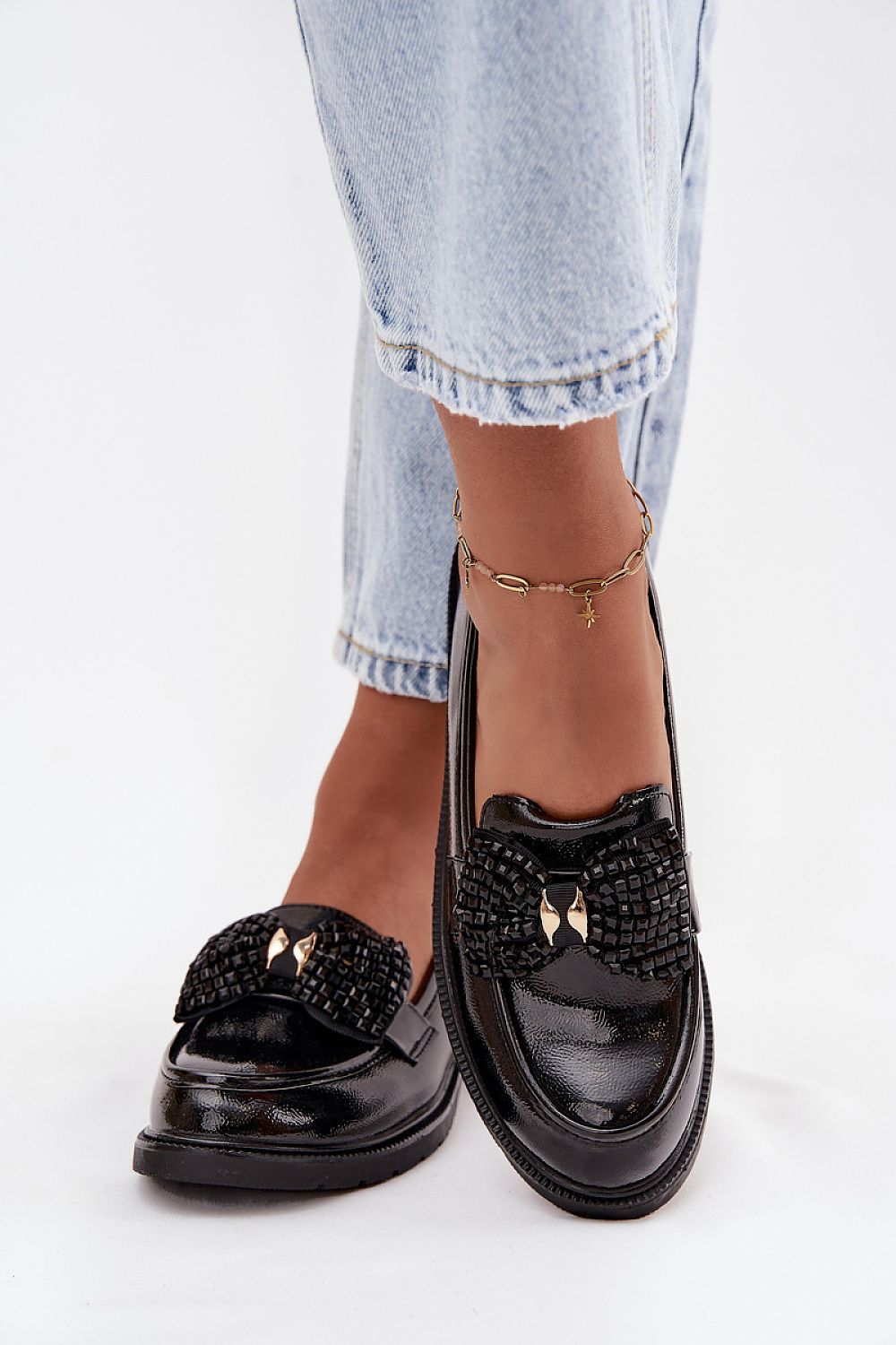 Elegant S.Barski moccasin loafers with bow decoration from Step in style, crafted in comfortable artificial leather, available in sizes EU 36-41, perfect for sophisticated outfits.