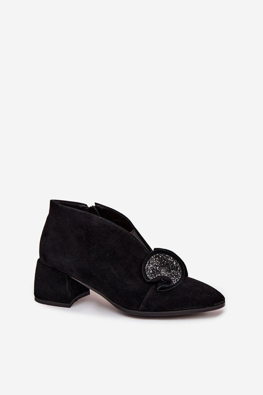 Step In Style's luxurious women's ankle boots made of high-quality natural suede, showcasing a classic design ideal for both formal and evening occasions.