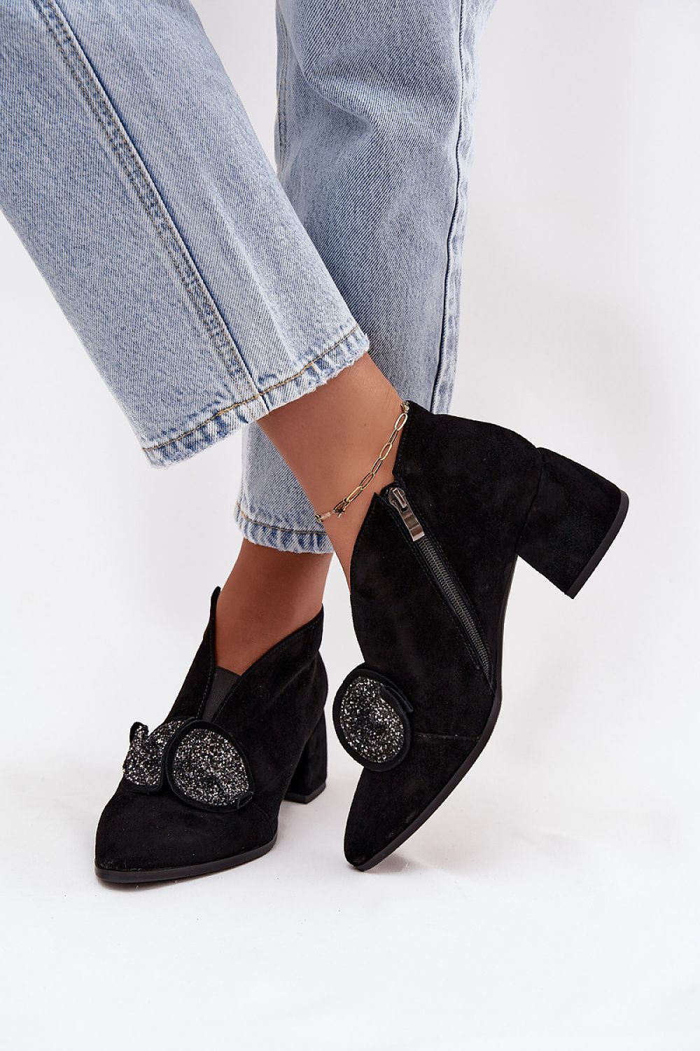 Chic and comfortable ankle boots from Step In Style, designed with a zipper closure for easy wear, combining elegance with everyday practicality.