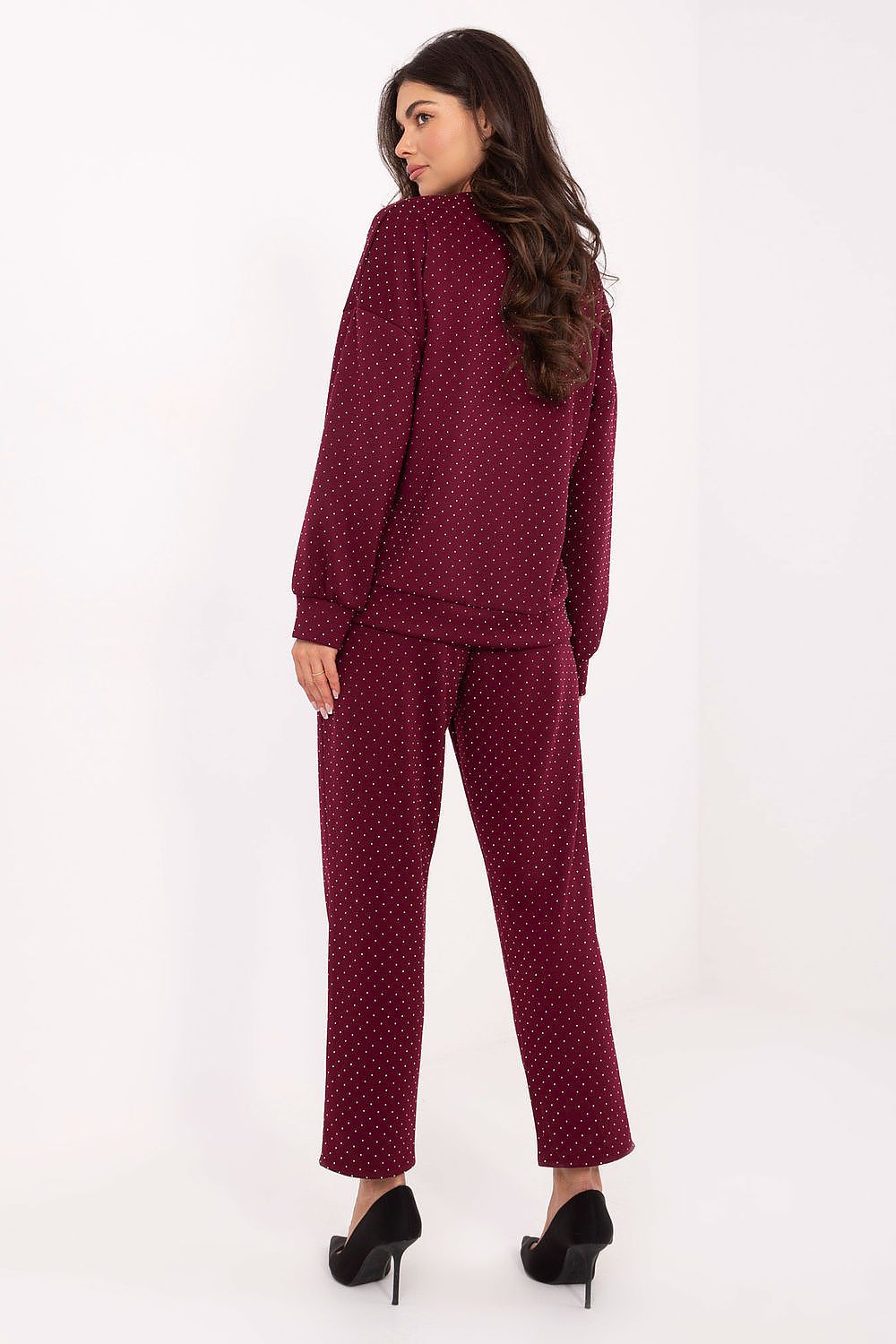 Trendy women's sweatshirt and pants set by Rue Paris, offering a harmonious combination of style and comfort for modern women.