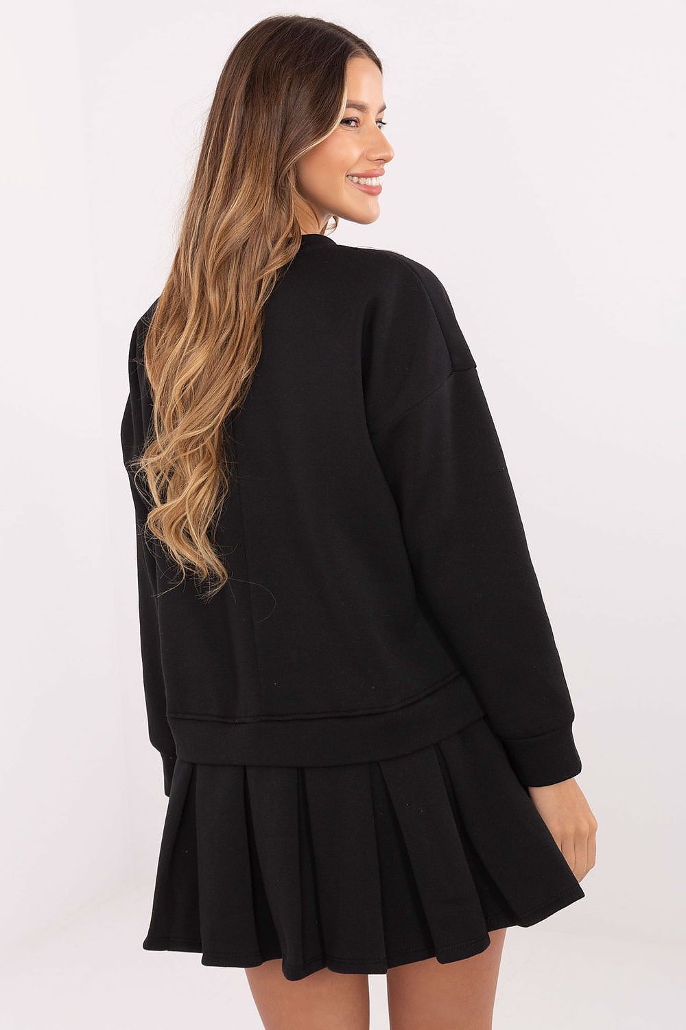 Chic Cotton Spandex Mini Dress by Rue Paris, showcasing a stylish flared design and pleated bottom, ideal for adding a touch of elegance to casual outings.