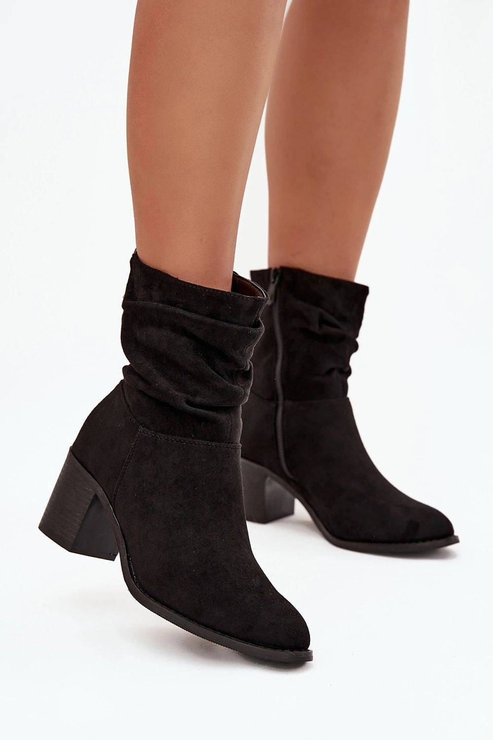 Close-up of Step in Style women’s eco suede ankle boots featuring a fashionable gathered design and stable column heel, combining style and comfort.
