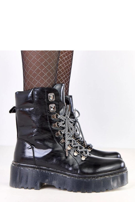 Stylish Solea women's lace-up trapper boots with a 5 cm heel, designed for a perfect fit and embellished with decorative crystals.