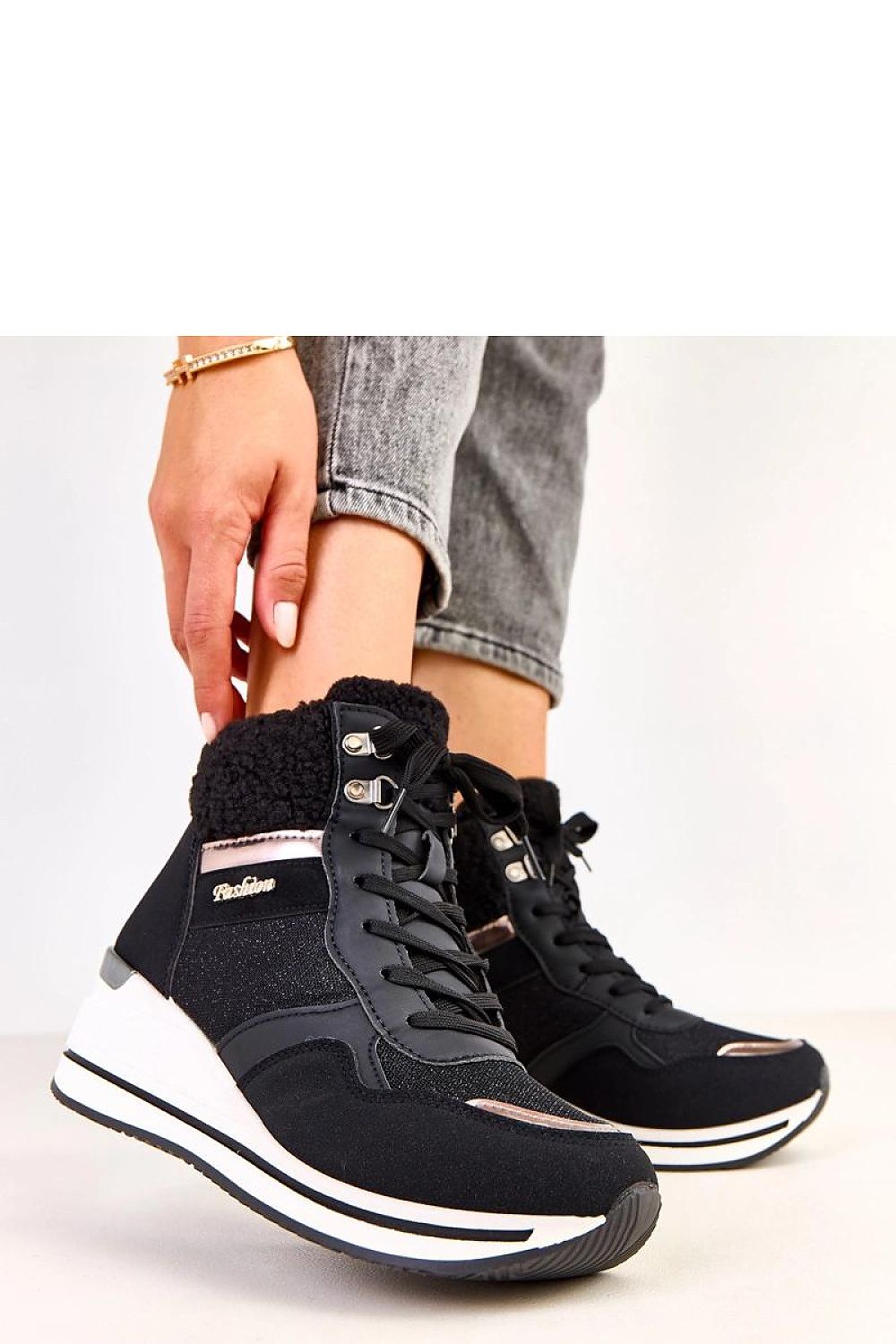 Chic Solea women's snow boots showcasing a sporty design, round toe, and luxurious faux fur lining to ensure warmth and comfort during winter outings.