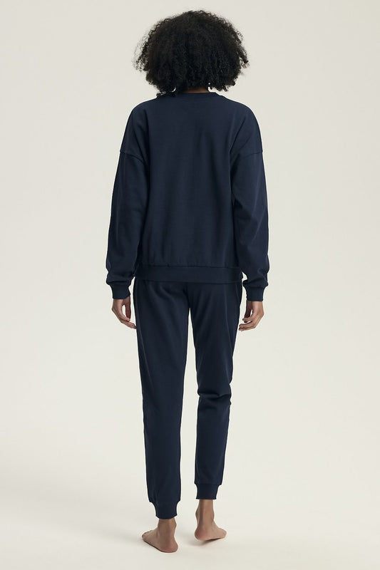 Soft and breathable Henderson women's pajamas showcasing a modern casual design with a round neckline and cuffs, ideal for a luxurious homewear experience.