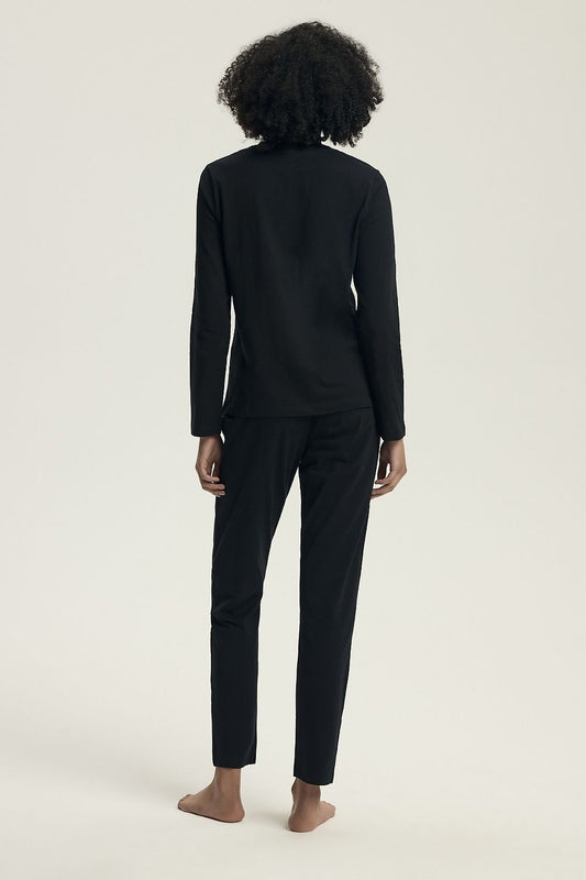 Luxurious Henderson women's cotton pyjama set featuring a classic long sleeve blouse with modern slogan detailing and wide elastic pants, available in sizes S to XXL, perfect for elegant home relaxation.