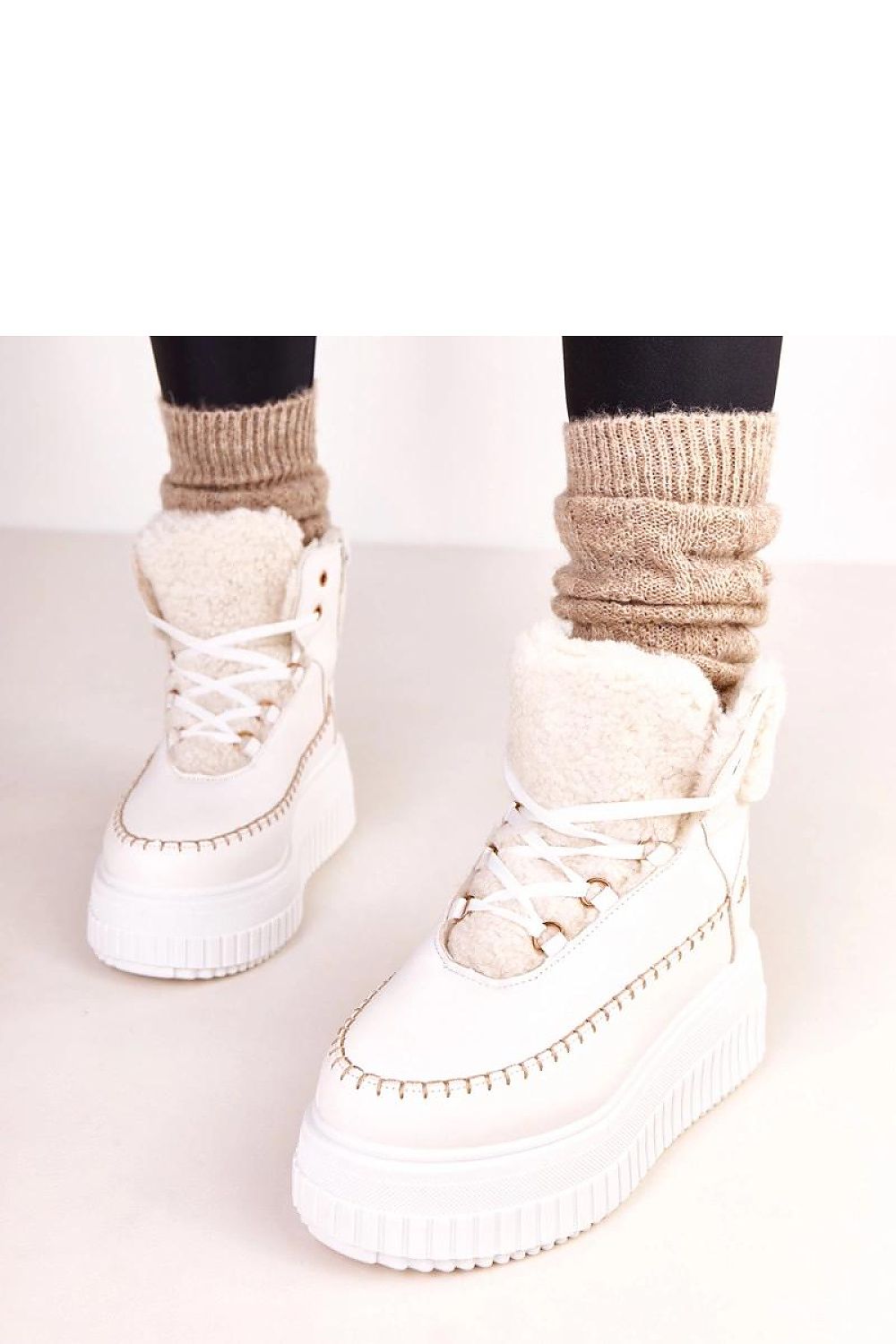 Solea stylish eco-leather ankle boots, featuring a sturdy shaft height of 12cm, blending style and comfort effortlessly.