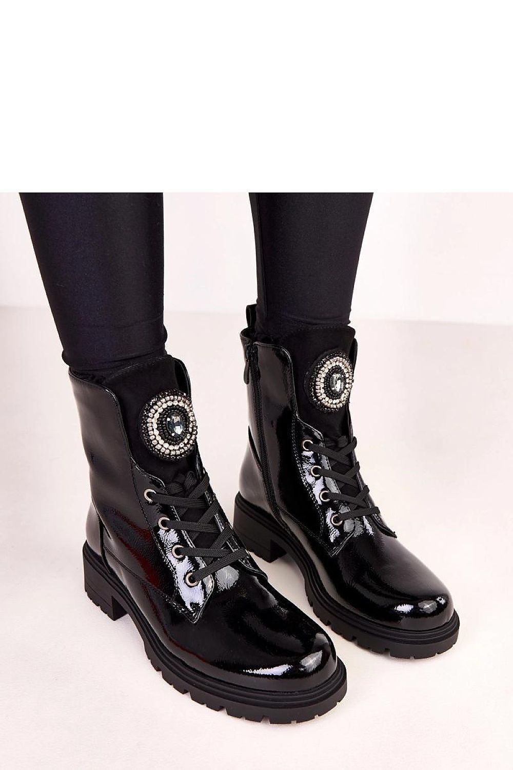 Luxurious Solea stylish ankle boots featuring a sleek zipper, plush warm interior, and elegant 4 cm heel, designed for comfort and urban sophistication, suitable for EU sizes 36-41.