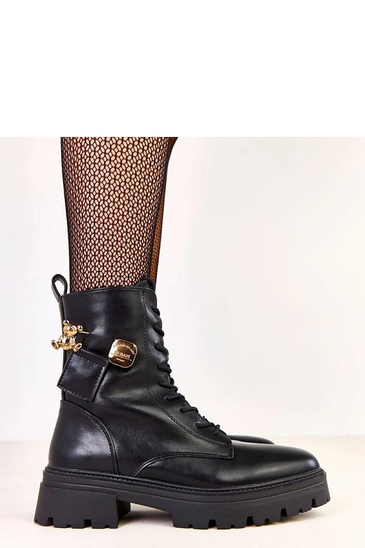 Comfortable eco-leather women's ankle boots with a modern design by Solea, showcasing a round toe and warm insulation.