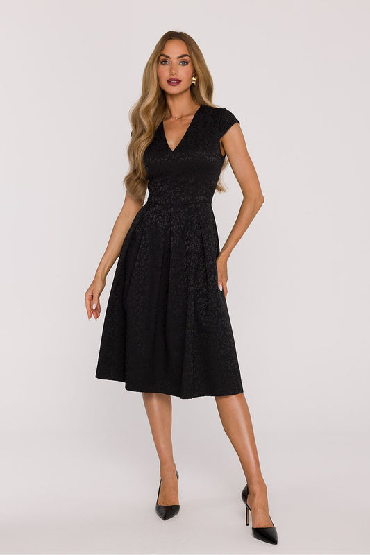 Details of the Elegant V-Neck Knee-Length Dress by Moe, featuring a defined waist and flared bottom, exuding sophistication and feminine charm.