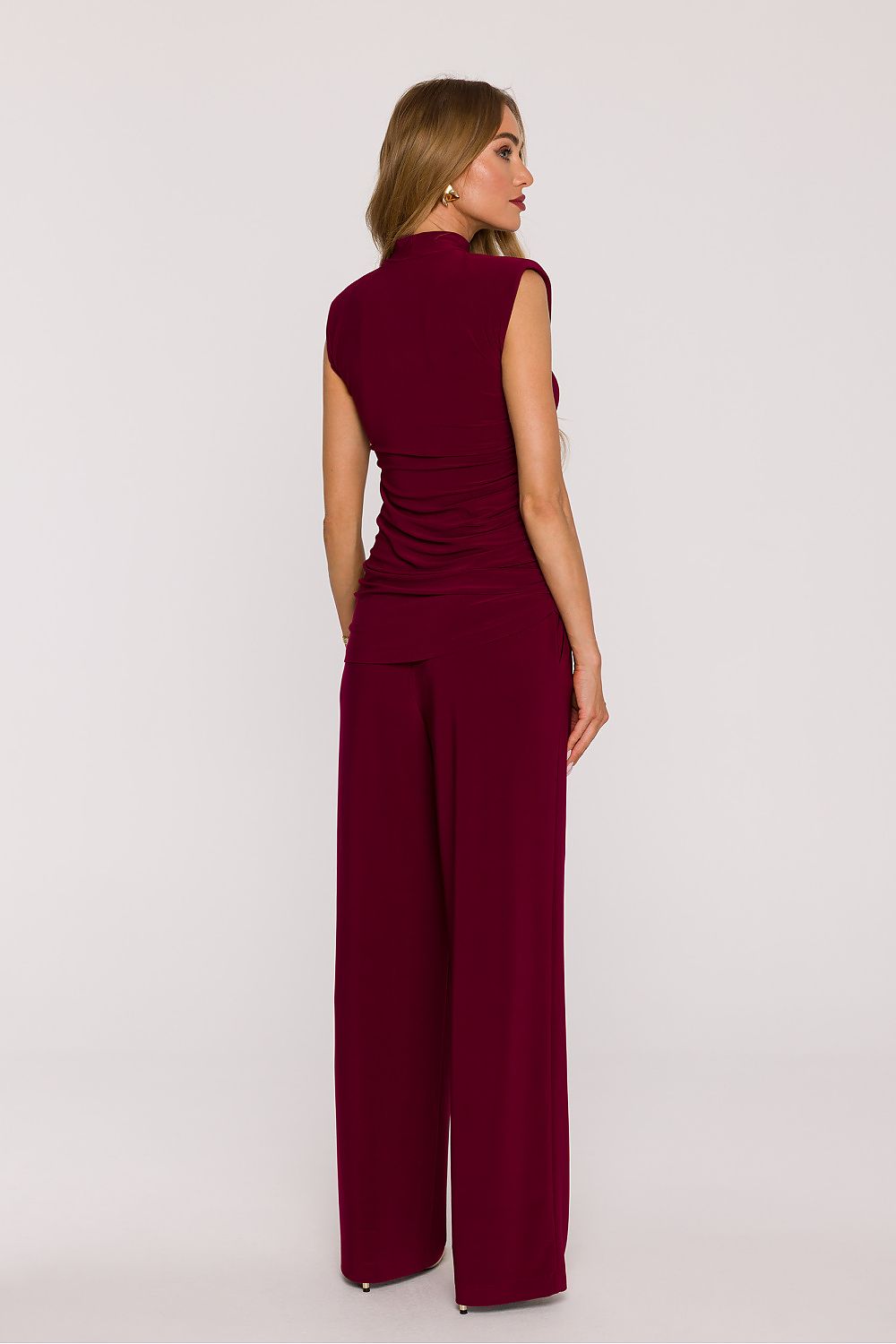 Elegant detail of Moe's Women's Knit Set illustrating the asymmetrical finish and refined style ideal for special occasions.