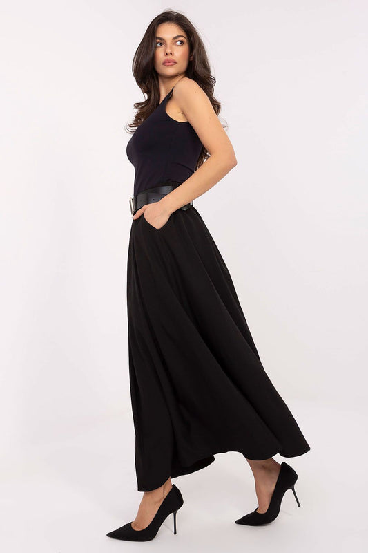 Luxurious long flared maxi skirt in a lightweight viscose and polyester blend, designed by Italy Moda to provide comfort and elegance with side pockets.