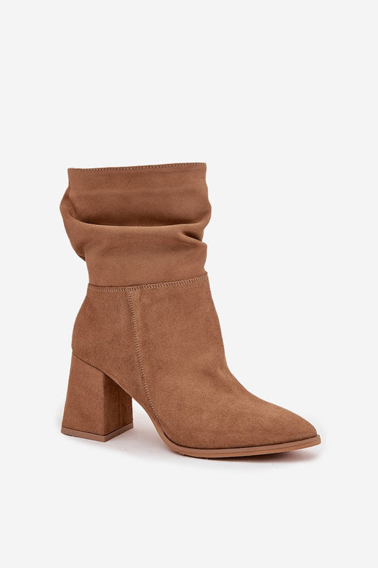 Stylish and warm women's ankle boots made of natural suede by Step in Style, showcasing a side zip and felt lining for comfort.