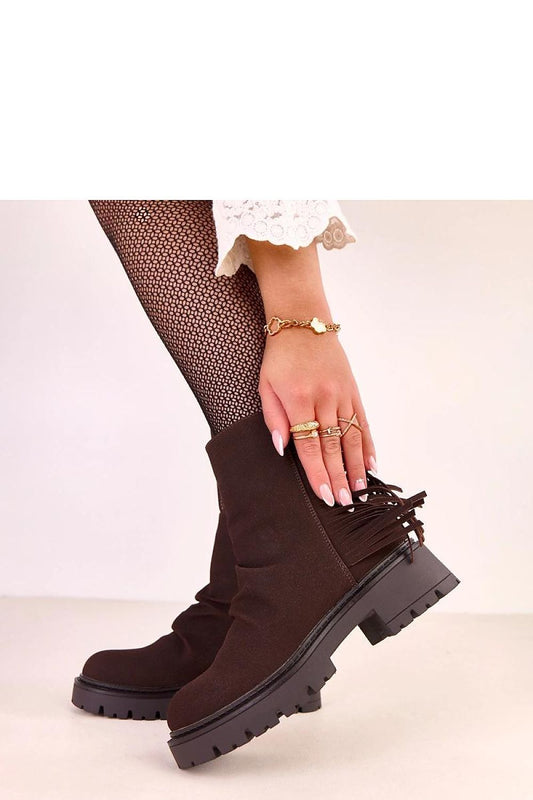 Close-up of Solea luxury ankle boots with round toe design and warm lining, ideal for comfort and style during colder days.