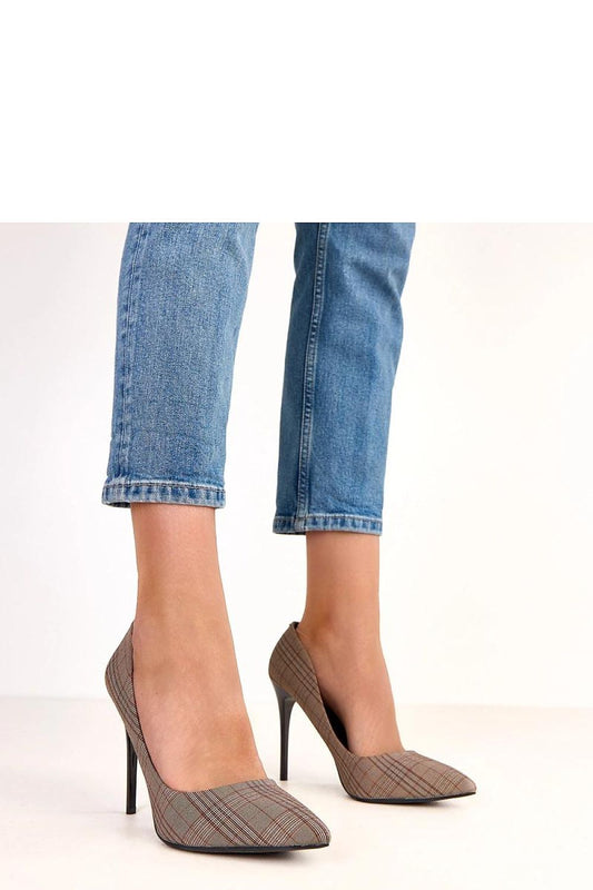 Close-up view of Solea high heels with checkered pattern, highlighting the luxurious fabric and sophisticated design suitable for both business and evening wear.