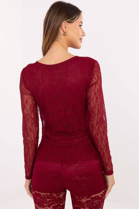 Italy Moda's elegant lace blouse in EU Size 0, highlighting its openwork pattern and long sleeves that subtly reveal shoulders, perfect for both formal and casual occasions.