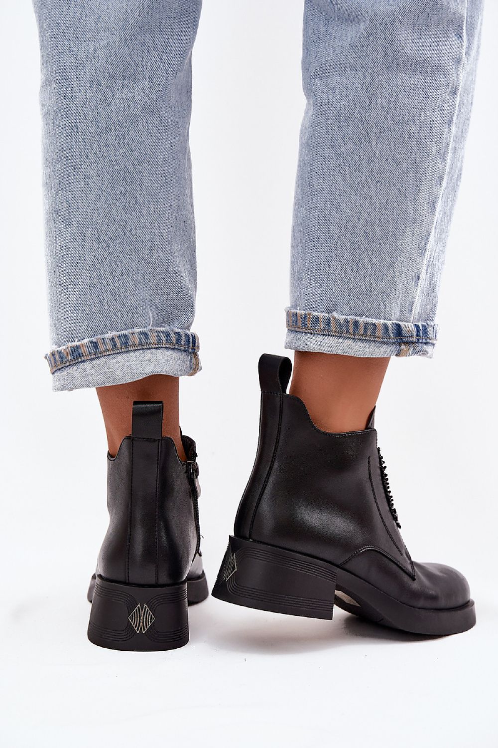 Elegant women's natural leather ankle boots with block heel and zipper feature from Step in Style, embellished with delicate bead decoration, perfect for any sophisticated outfit.