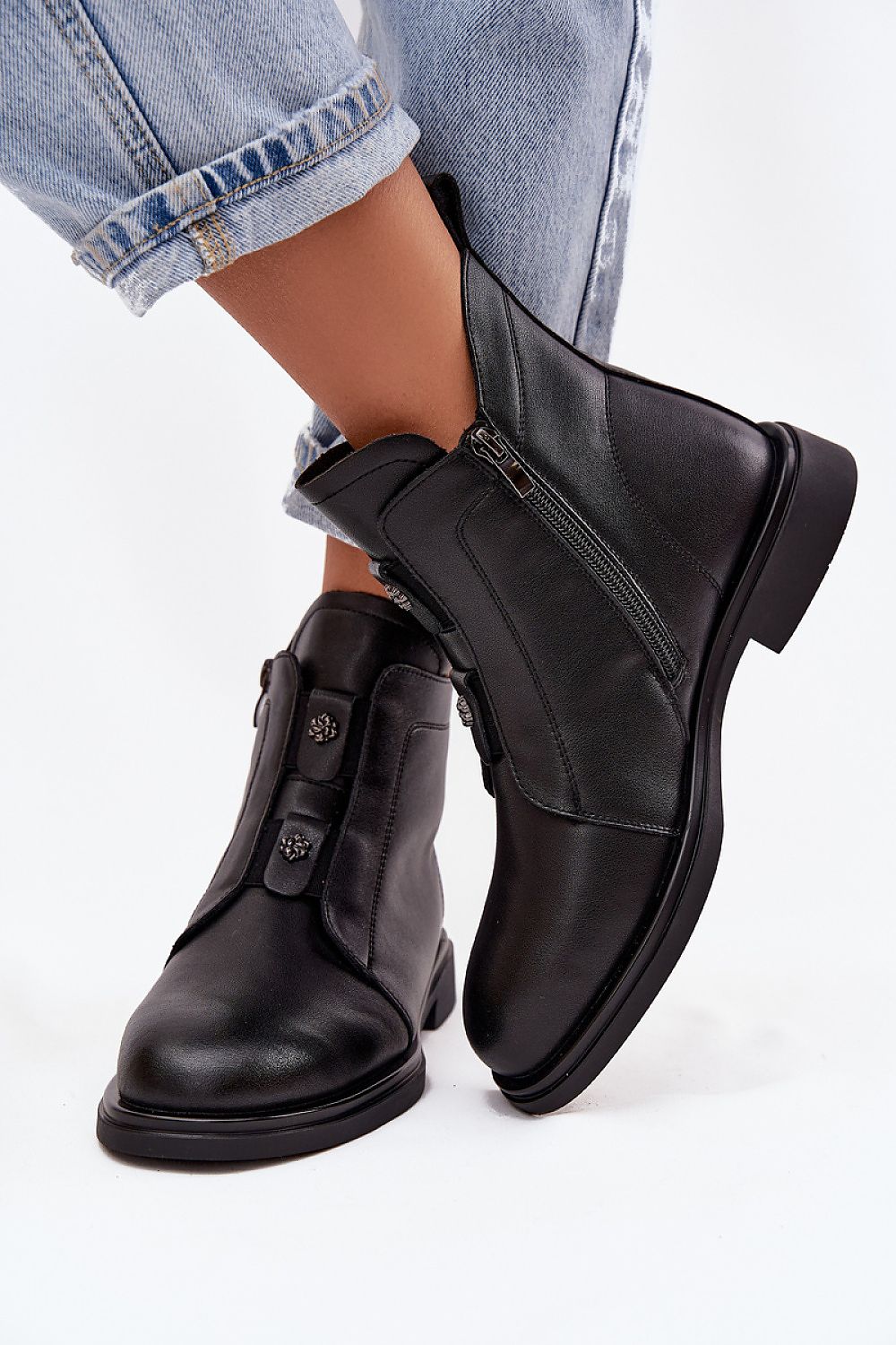 Sophisticated women's ankle boots in natural leather from Step in style, showcasing exquisite decorative details and a comfortable flat heel ideal for both casual and upscale occasions.