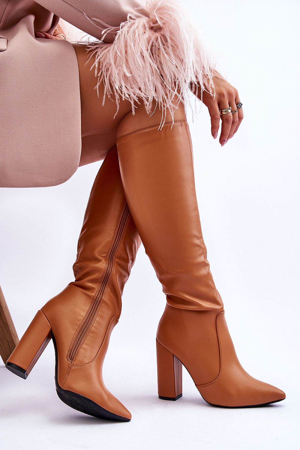 Luxury eco leather high-heeled boots with a sleek silhouette by Step in style, featuring a refined pointed toe and a 10.5 cm column heel, perfect for an elegant look.