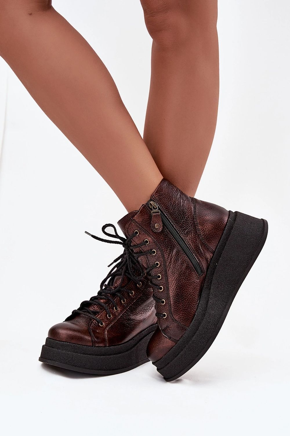 Close-up of Maciejka Women's Natural Leather Boots featuring fine craftsmanship, a comfortable fit with soft insole, lacing, and zipper, perfect for fashion-forward women by Step in Style.