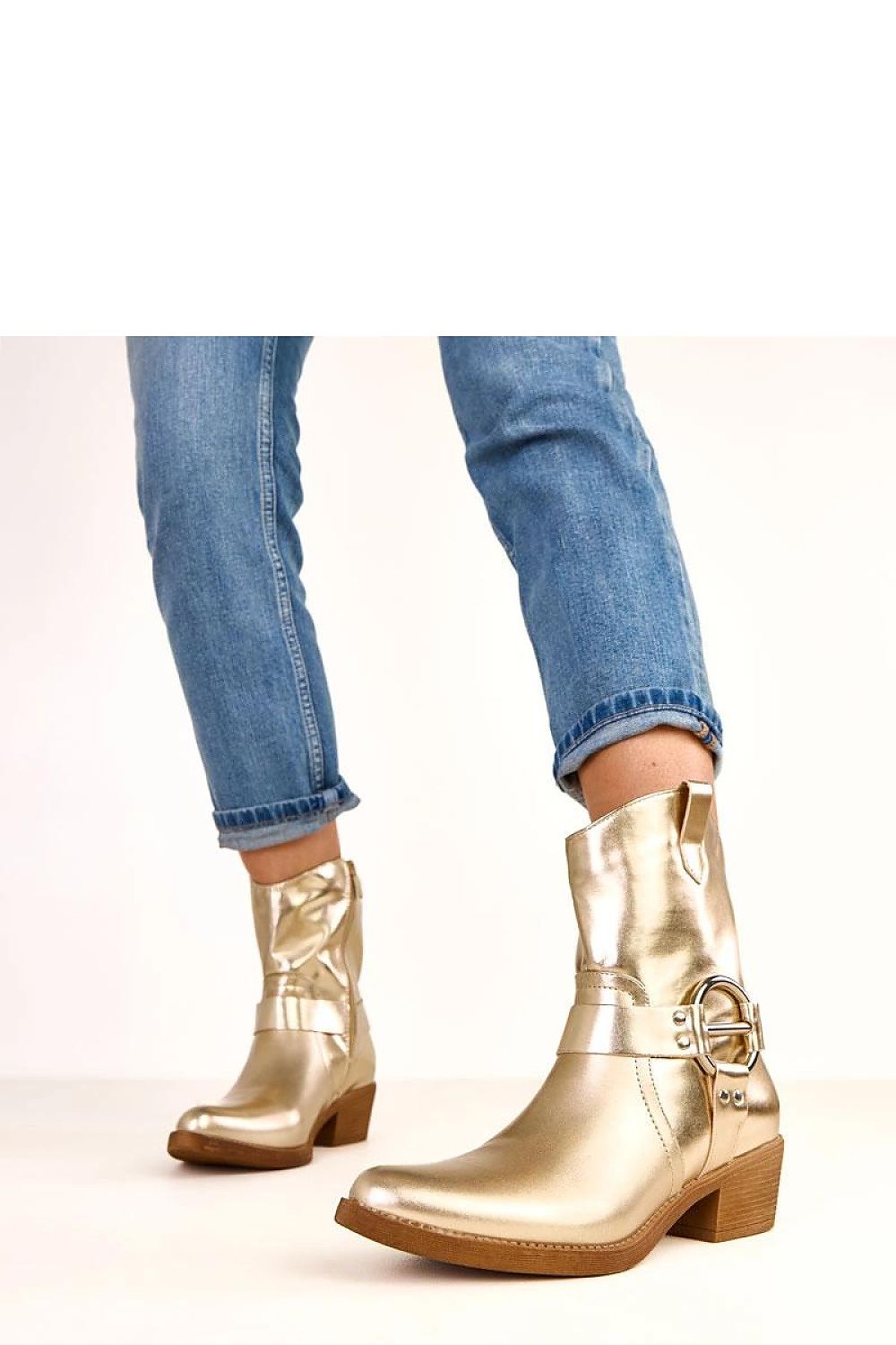 Stylish gold ankle boots by Solea with a sleek pointed toe and eco-friendly leather, designed for women who appreciate luxury and elegance.