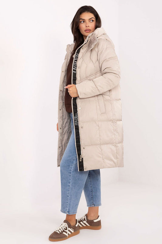 Chic and elegant women's down jacket by MBM with hood and quilted design, perfect for cold weather styling.