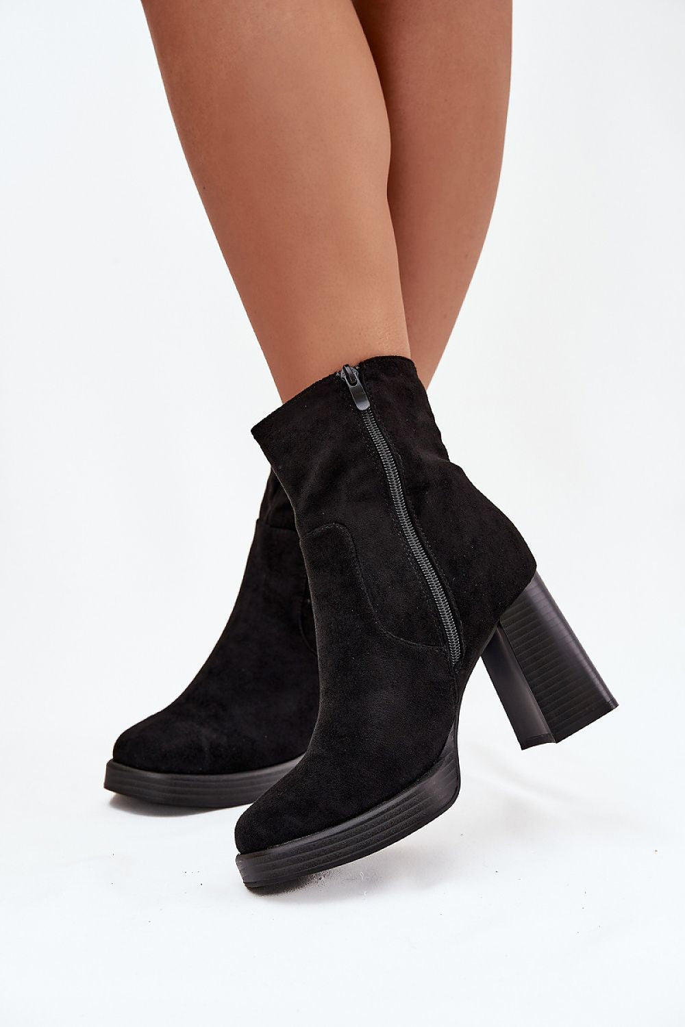 Fashionable women's faux suede ankle boots with a stable column heel by Step in Style, ideal for both casual and elegant occasions.