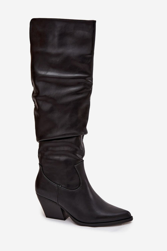 Close-up view of Step in Style's Elegant Women's Thigh-High Cowgirl Boots showcasing the luxurious eco leather material, pointed toes, and detail of the zipper for easy wear.