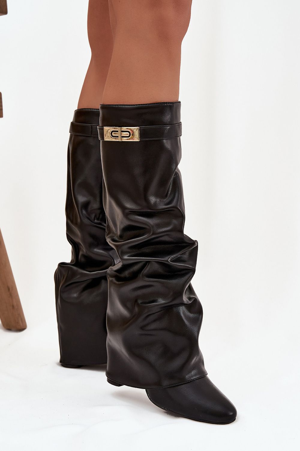 Elegant eco-leather knee high heel boots by Step in Style featuring a ruched design and a stable column heel, ideal for adding sophistication to any ensemble. Available in sizes EU 36-41.