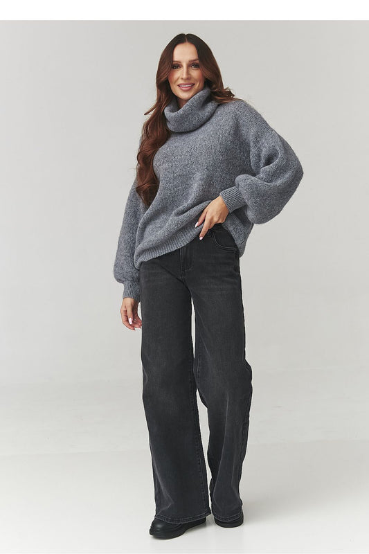 Stylish Makadamia oversized turtleneck in soft knit, showcasing a relaxed silhouette ideal for both casual and elegant outfits.