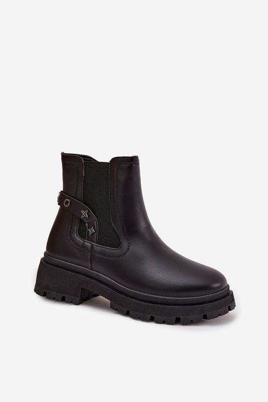 Chic close-up of eco leather women's ankle boots by Step in style, showcasing the intricate decorative strap details and zipper for easy wear.