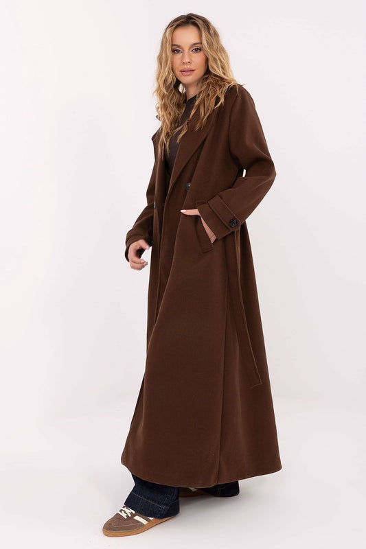 Stylish double-breasted long coat for women, showcasing refined lapels and functional pockets, perfect for versatile dressing.