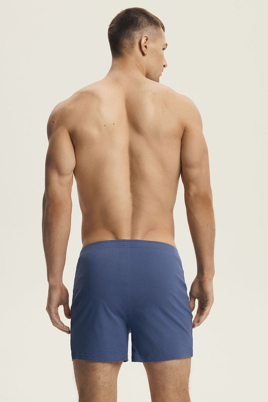 Close-up of Henderson Men's Cotton Boxer Shorts in elegant cotton fabric, highlighting the elastic waistband and classic minimalist style ideal for discerning gentlemen.