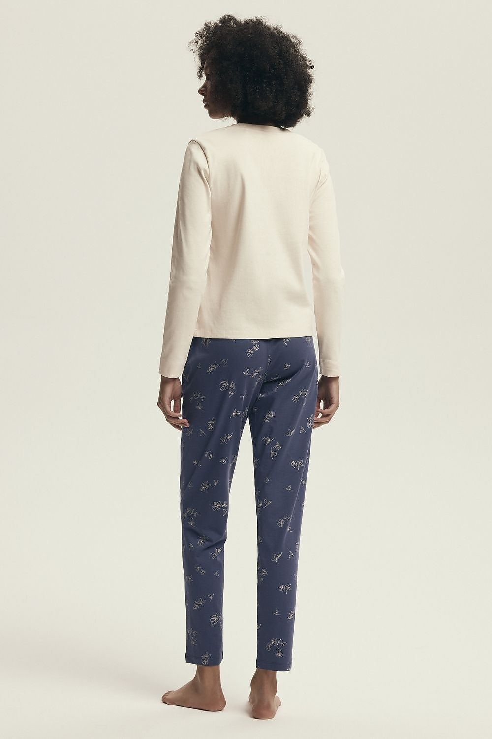 Elegant Women's Cotton Pyjamas Set by Henderson featuring a long sleeve V-neck blouse and comfortable pants, perfect for luxurious everyday wear.