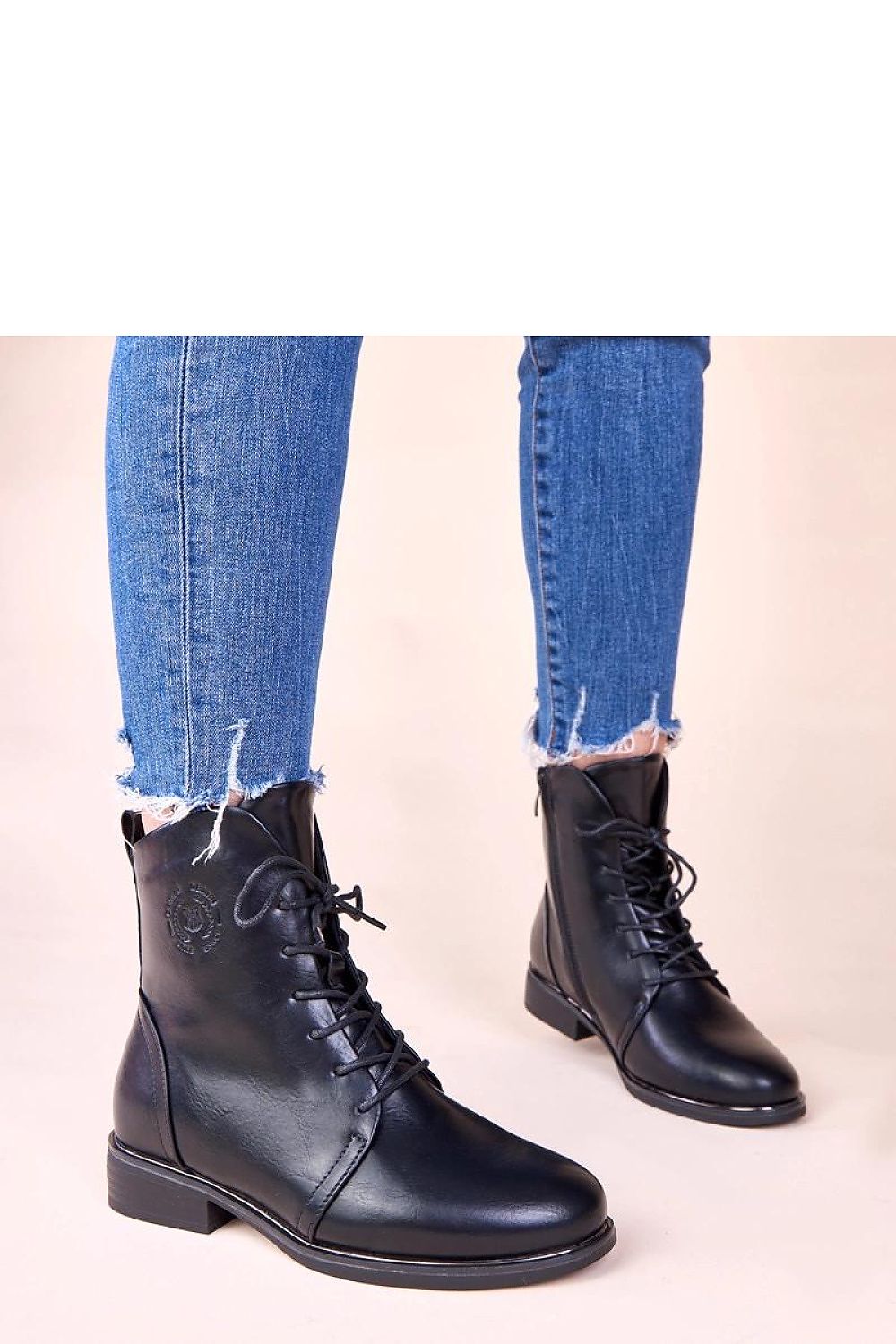 Solea's Gemre Eladia black lace-up boots, offering chic insulation and a classic look, ideal for cold winters.