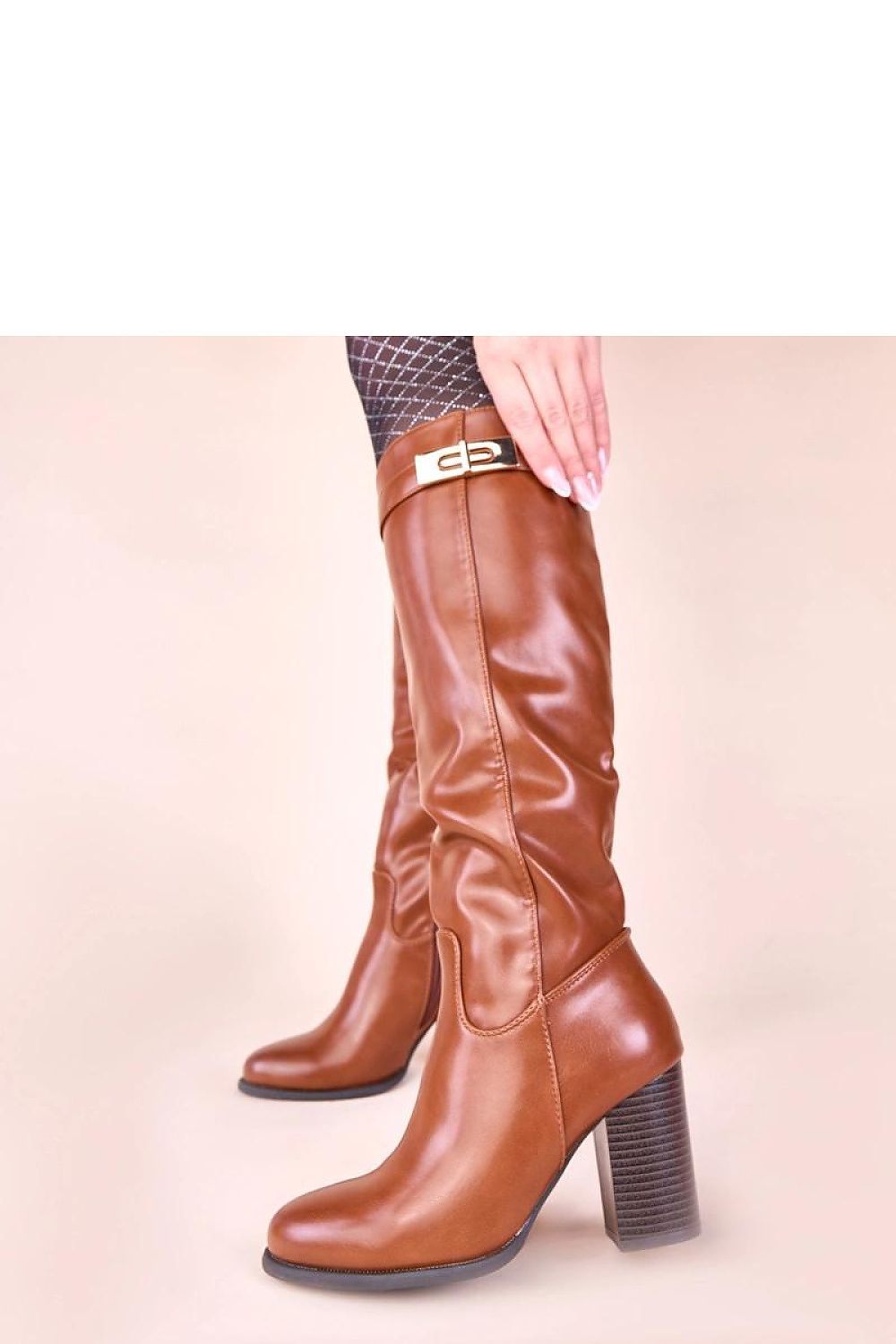 Solea Tessa Brown Heeled Boots displayed with elegant styling options, perfect for sophisticated women’s wardrobes.