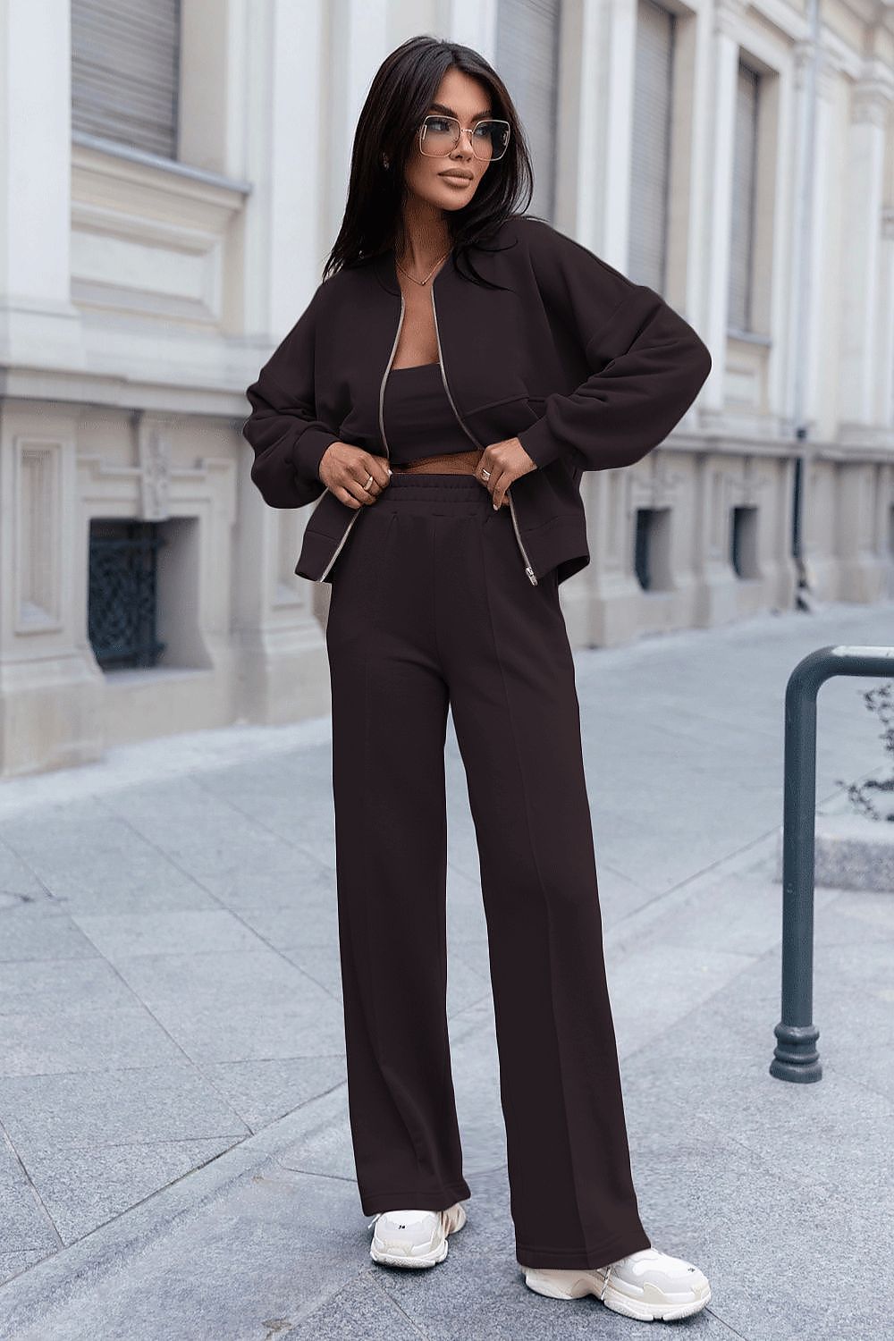 Elegant close-up of Misty two-piece cotton sweatshirt set, showcasing fine stitching and the sophisticated design of the bomber sweatshirt with wide-leg pants, ideal for fashion-forward styling.