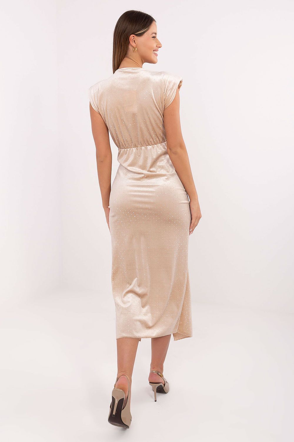 Model wearing the Italy Moda Midi Pencil Dress featuring stylish pleats and a daring front slit, perfect for formal occasions and special events.