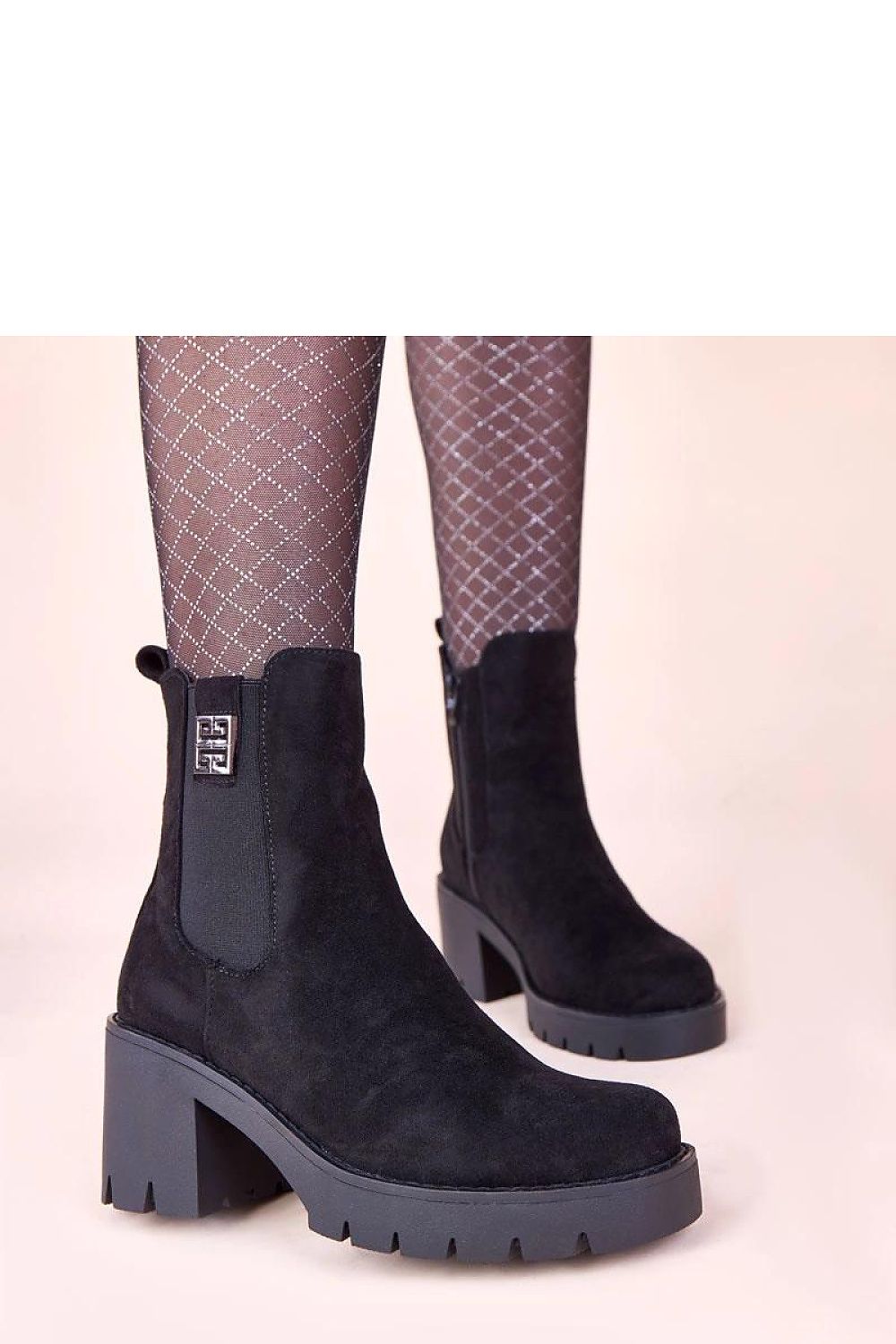 High-quality black ankle boots with a 7 cm heel by Gemre, designed for exceptional comfort and stability, enhancing any modern outfit.