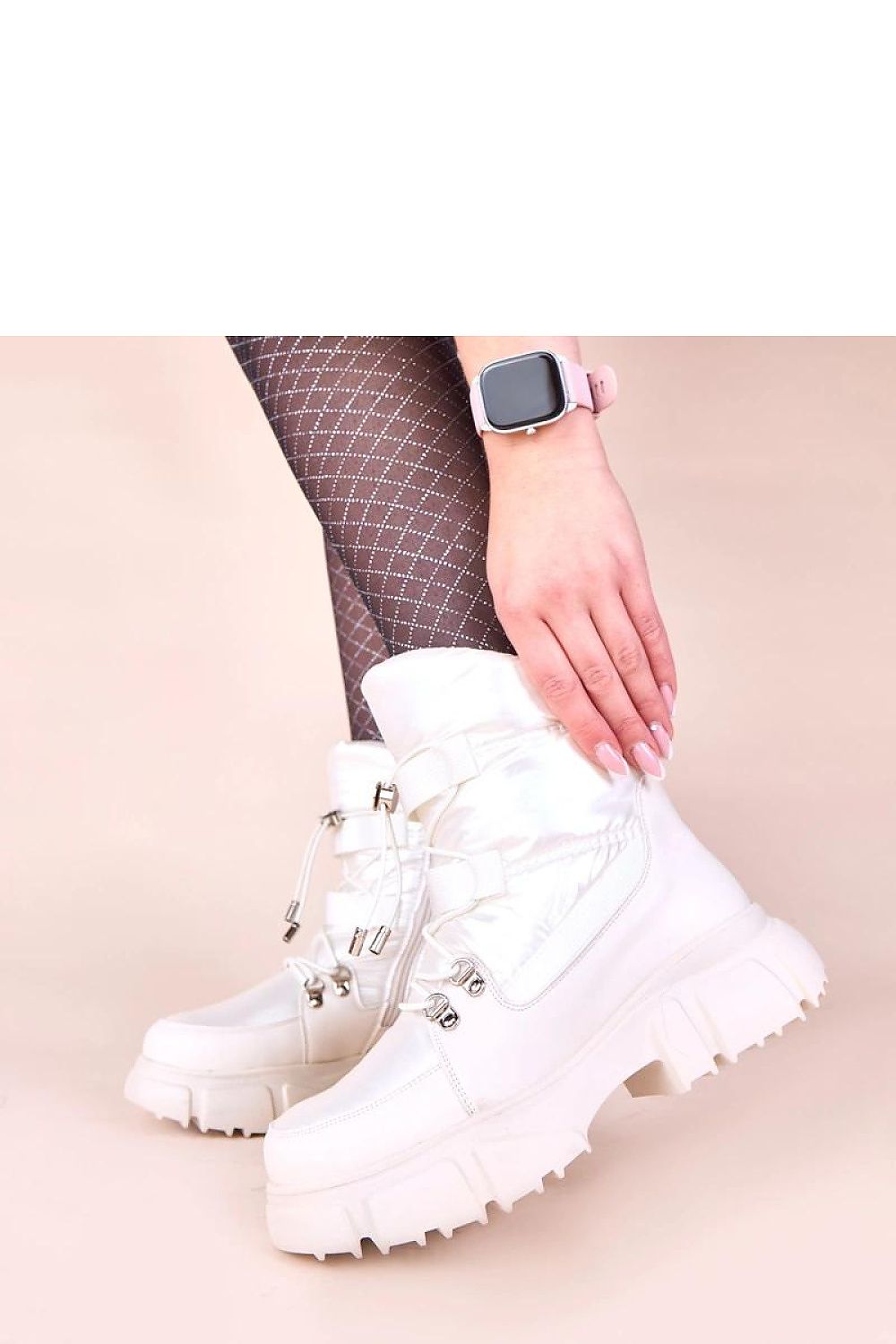 Jassi Women's Pearl Glow Snow Boots in luxurious artificial leather with pearl finish, designed for winter comfort and style from Solea.