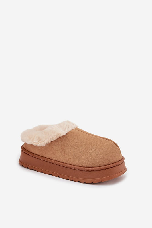 Close-up of Step in Style's eco-suede slippers, featuring plush fur lining for superior warmth and elegance perfect for home relaxation.