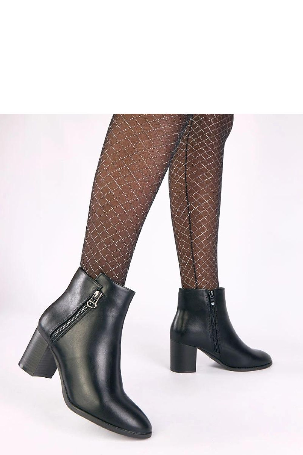 Elegant Solea Ankle Boots featuring a decorative zipper and a 7cm heel, blending luxury and comfort in sizes EU 36-41.