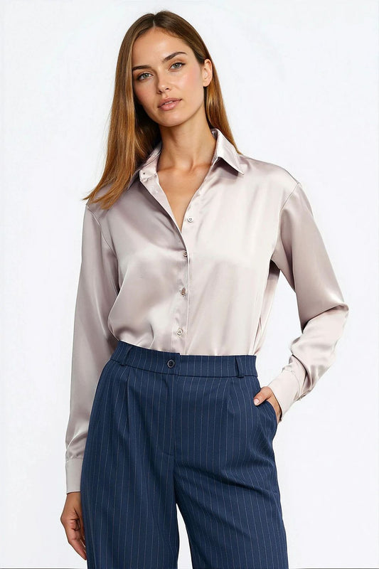 Close-up of Nife shapewear body, highlighting luxurious satin finish and delicate button fastening for a sophisticated look.